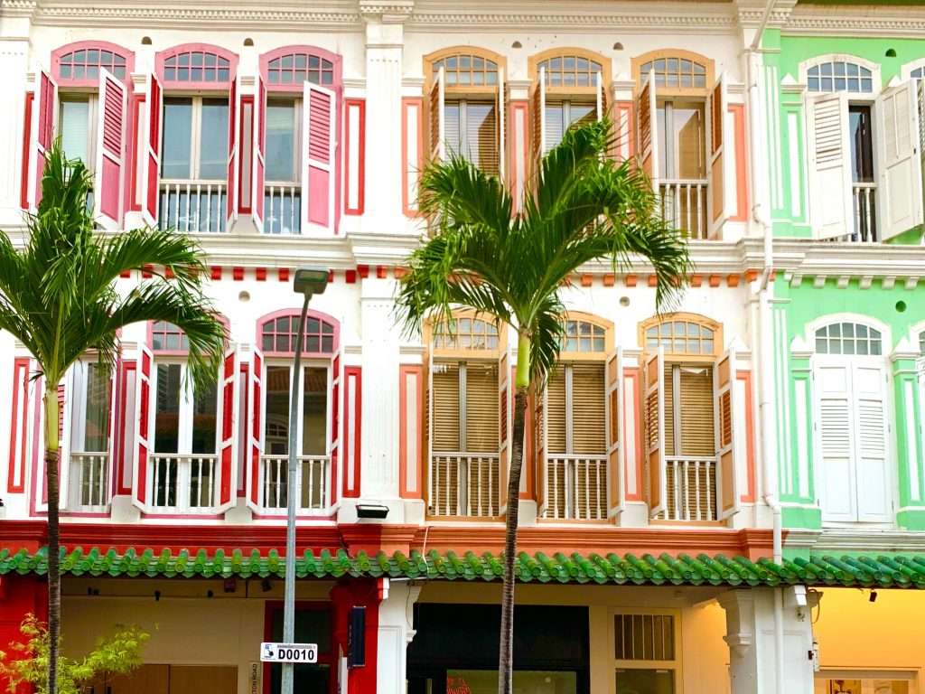 Colonial row houses with colorful trim